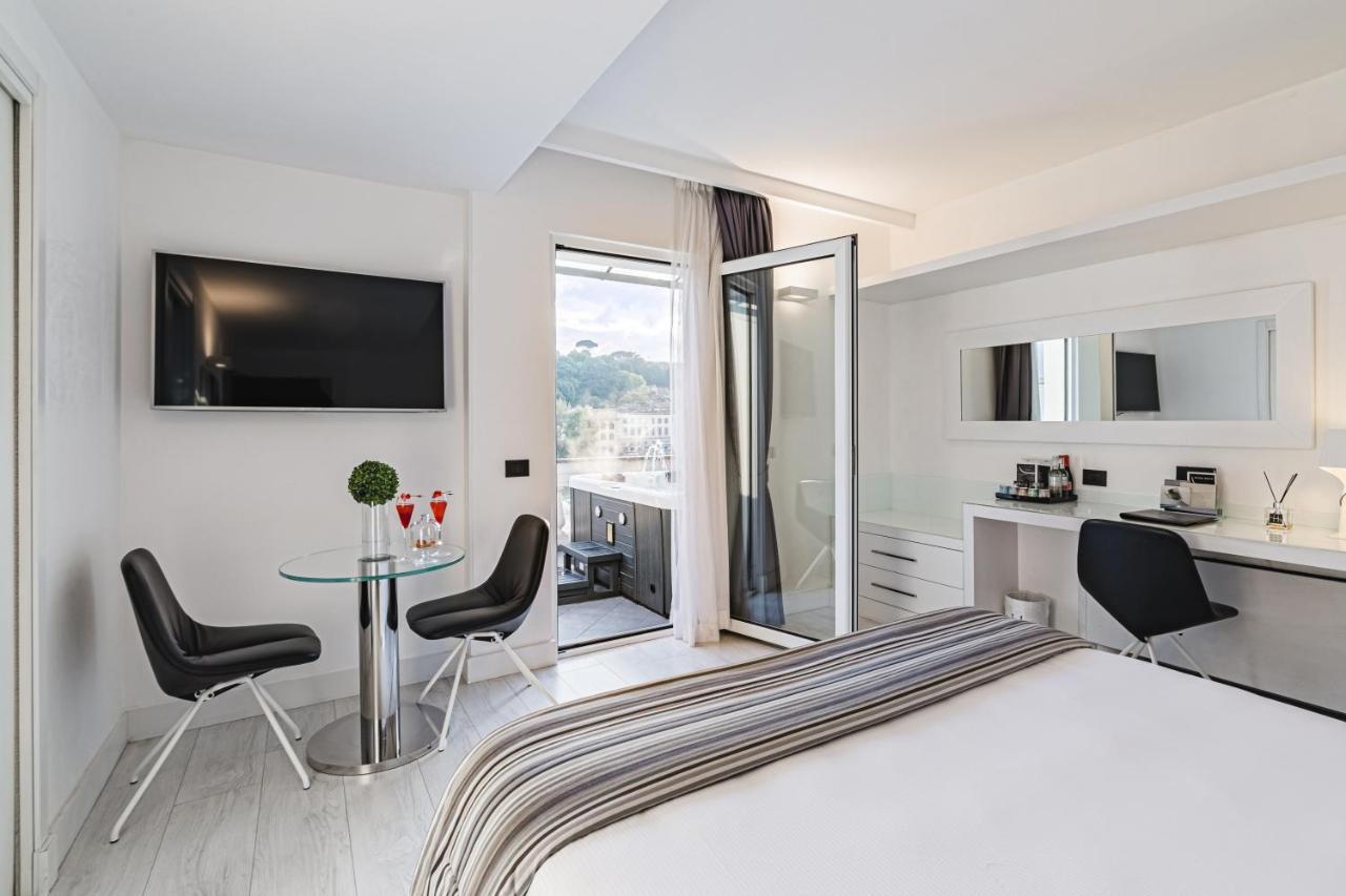 LHP Hotel River&SPA Florenz Exterior foto A typical room at the hotel