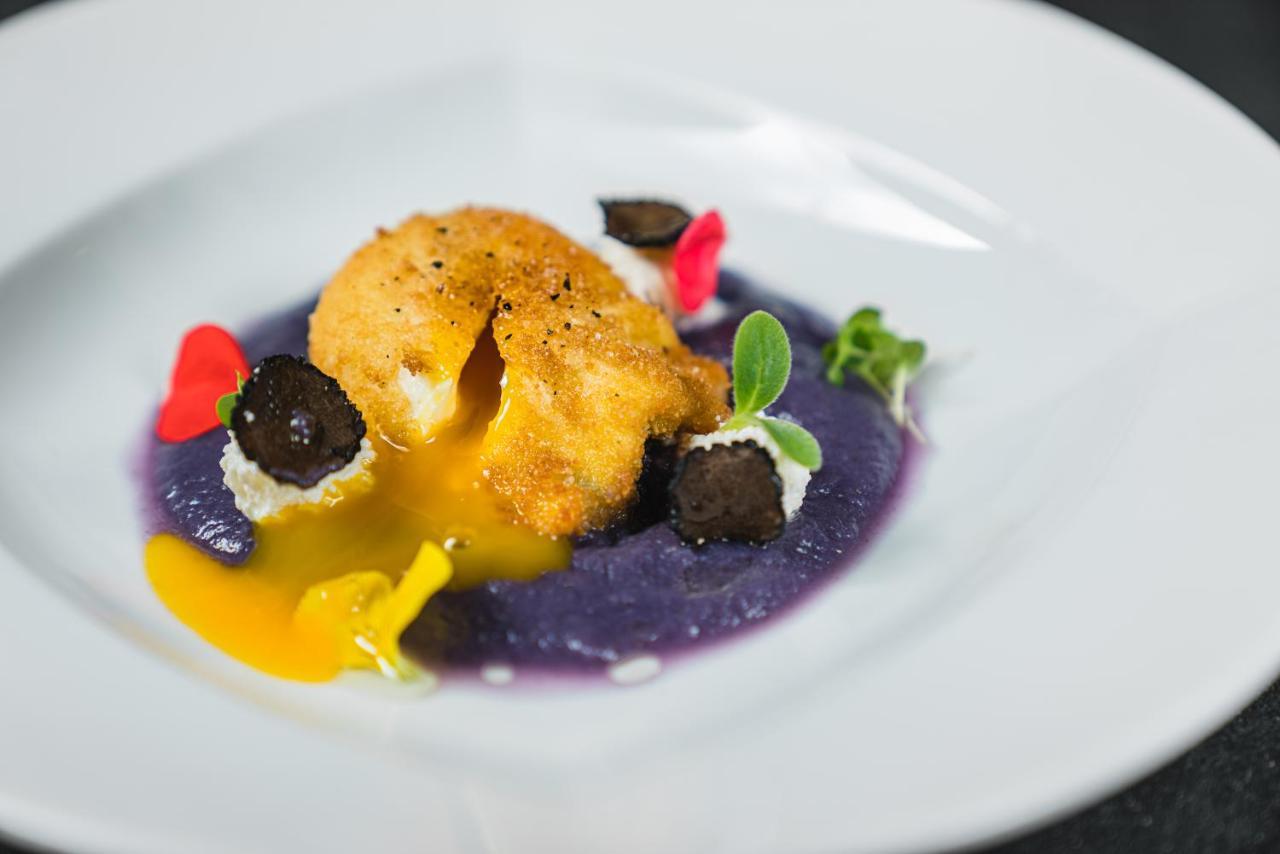 LHP Hotel River&SPA Florenz Exterior foto A dish from the restaurant