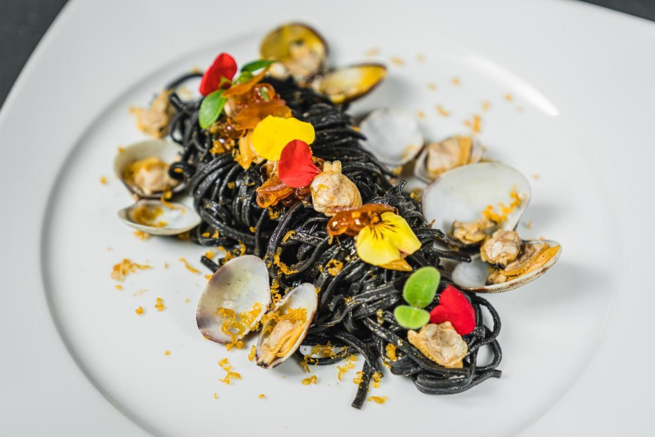LHP Hotel River&SPA Florenz Exterior foto Prune spaghetti